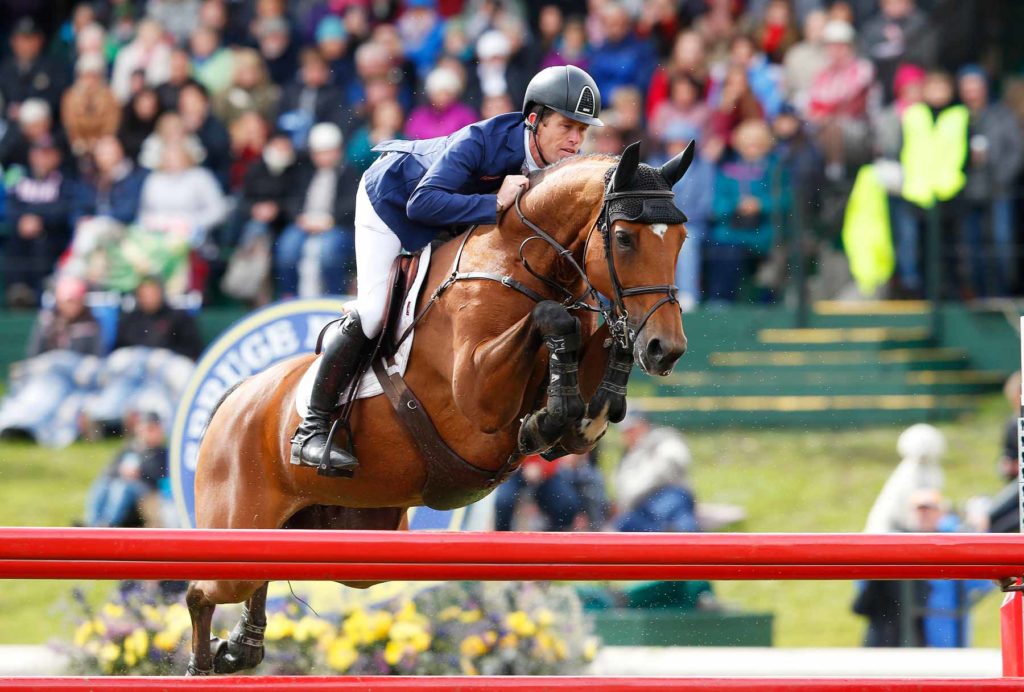 Scott Brash of Great Britain rides his horse Ursula XII on the final jump during a jump off to win the Spruce Meadows CP International Grand Prix on September 11, 2016 in Calgary, Alberta, Canada